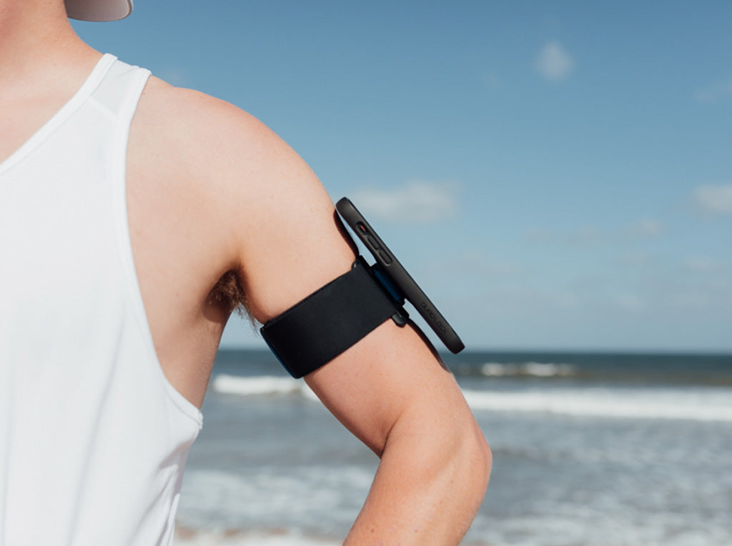 iphone 12 pro sits comfortable off arm with quad lock case armband