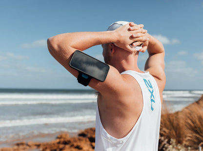runner with quad lock running armband taking a break