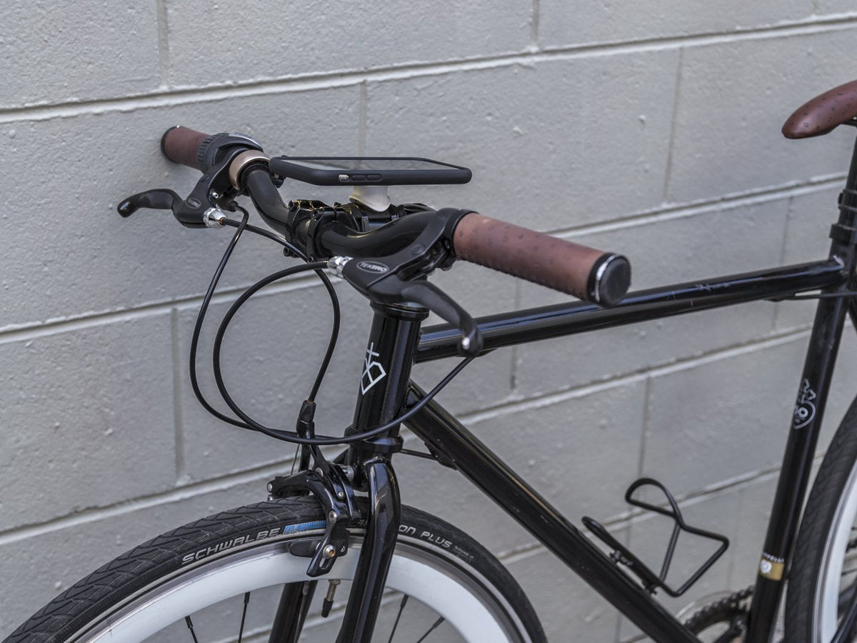 Quad Lock custom white collar bike mount on bike