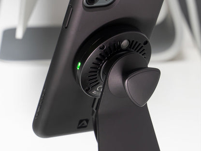 close up of wireless charging head on desk mount