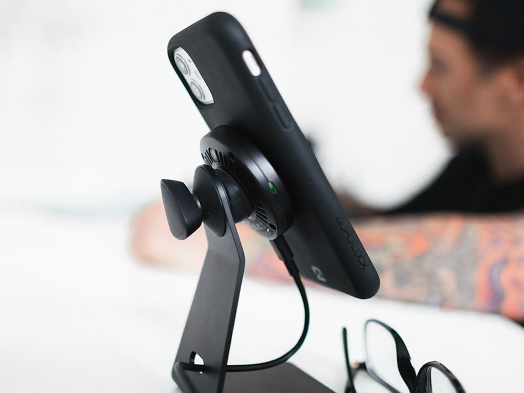 artist at work with quad lock desk mount