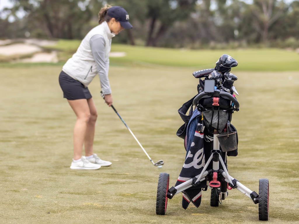 golfer ready to hit ball on golf course