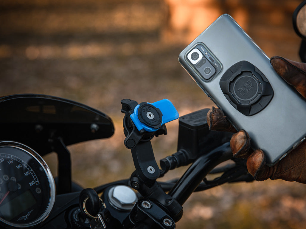 Quad Lock Universal Adaptor on phone case with Motorcycle Handlebar Mount with Vibration Dampener