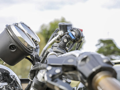 side view of quad lock motorcycle knuckle adaptor on triumph