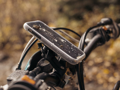 Quad Lock Protective Poncho for iPhone mounted on Handlebar Mount with Vibrational Dampener