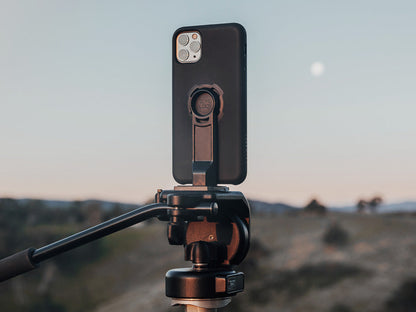 iphone 11 pro attached to tripod using quad lock adaptor